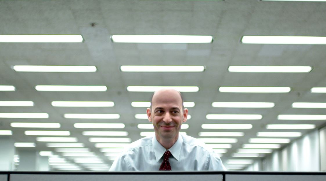 Actor Jeff Blumberg playing an office worker in a TV commercial